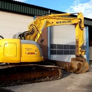 New Holland Kobelco E235SR- гусеничный экскаватор