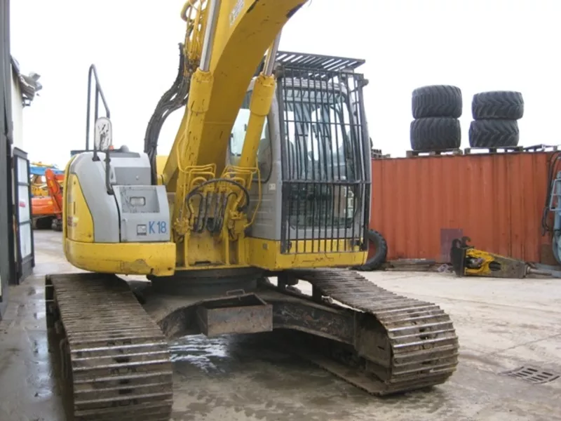 Гусеничный экскаватор  New-Holland - Kobelco E 235 SR-1ES Год выпуска: