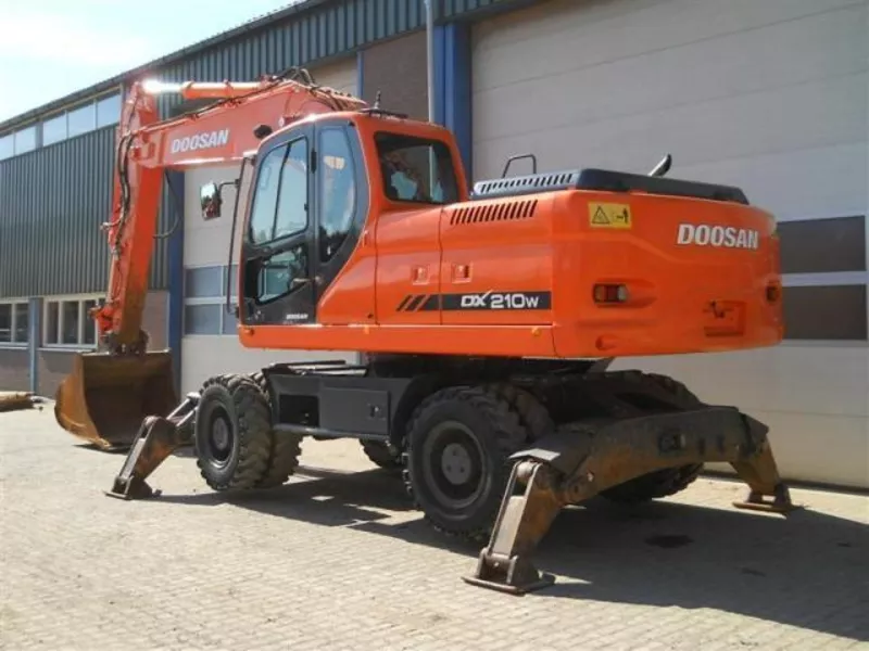 КОЛЕСНЫЙ ЭКСКАВАТОР Doosan DX210W